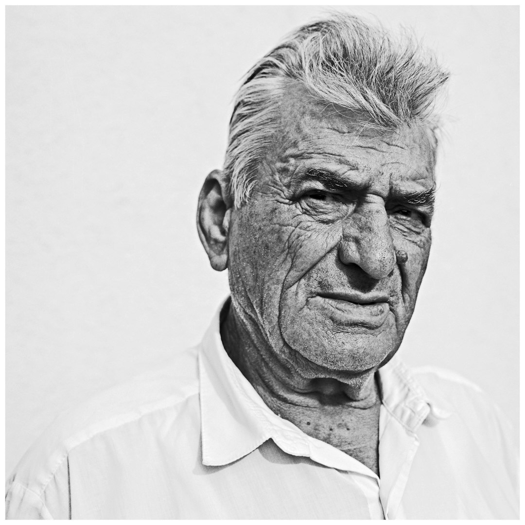 Portrait of a Croatian photographer holding a camera